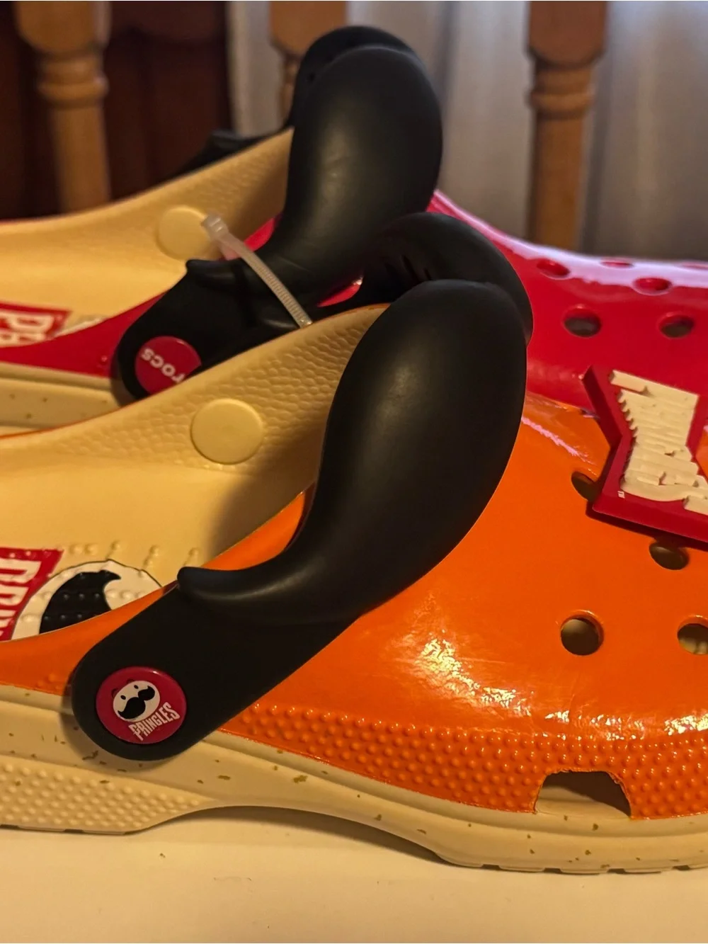Pringles Crocs Orange and Red Sandals with Black Moustache